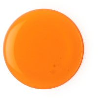 Good Karma Shower Gel a orange shower gel splodge on white background