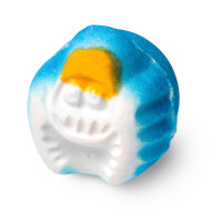 A white blue and yellow bath bomb shaped like a monster