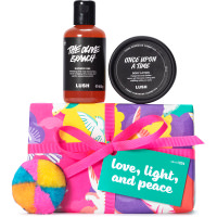 Love, Light and Peace Gift Purple, pink and yellow present with dove print on it surrounded by products