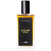 Lush 100ml Death and Decay Perfume A bottle of Death and Decay Lush perfume. The perfume is orange in colour and contained in a rectangle bottle featuring a black lid and label.