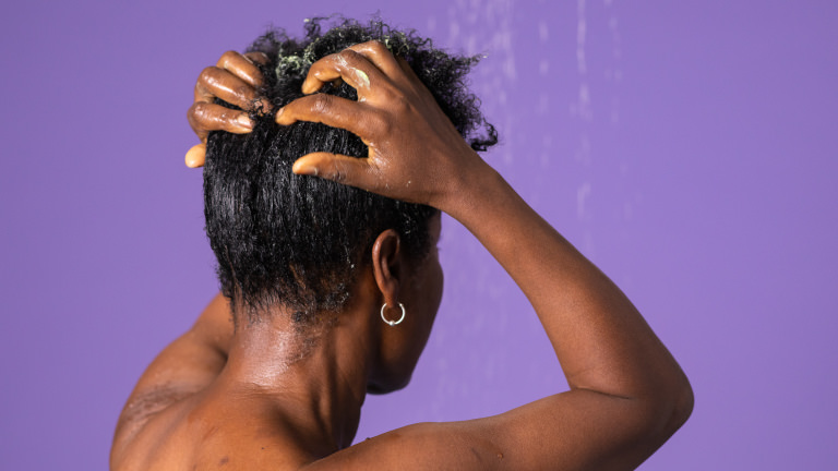 Glory a green hair conditioner being used in hair and scalp