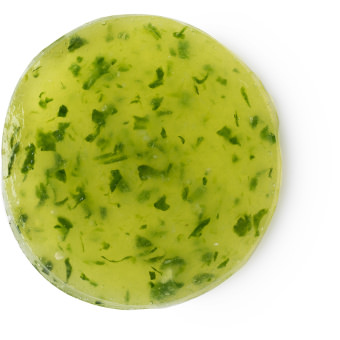 A cucumber shaped green eye mask