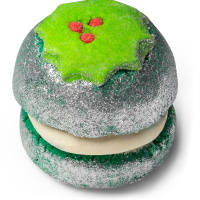 Spumante da bagno di Natale Puddy Holly Spumante da bagno di Natale Puddy holly rivestito di glitter argentati e con decorazione di agrifoglio