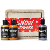 Snow Showers Gift brown box with red label on it and shower gels around it