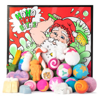 The Art of Christmas Bathing Gift red and green santa claus themed box with products around it