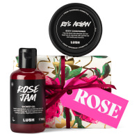 Rose Gift white and pink rose themed gift with products around it