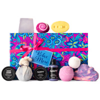 Relax More Gift pink and blue floral themed gift box with products around it