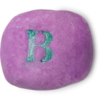 purple bubble bar with the letter b written in green glitter on top