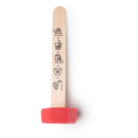 New Hot Oil Hair Treatment A solid red hair treatment on a stick