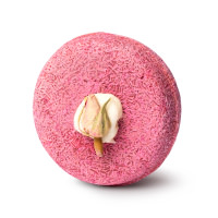 Angel Hair Shampoo Bar A light pink, round shampoo bar with a rose petal in the centre