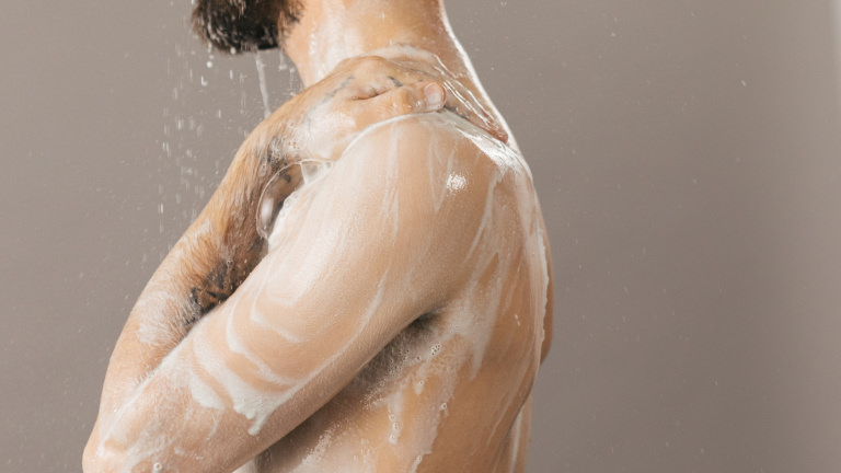 oaty creamy dreamy moisturising shower cream A person using a white shower cream
