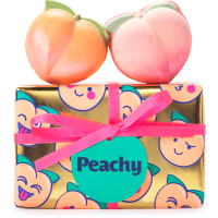 Peachy Gift Box golden wrapped present with peach illustrations and products on top