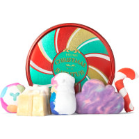 Christmas Bath Tub Gift circular tin with christmas pattern on it and products around it