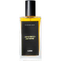 Lush 100ml Superworld Unknown Perfume A bottle of Superworld Unknown Lush perfume. The perfume is orange in colour and contained in a rectangle bottle featuring a black lid and label.