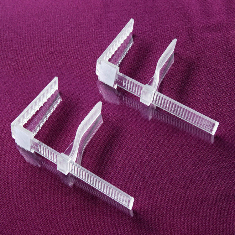 Clips till bordskjol reglerbar