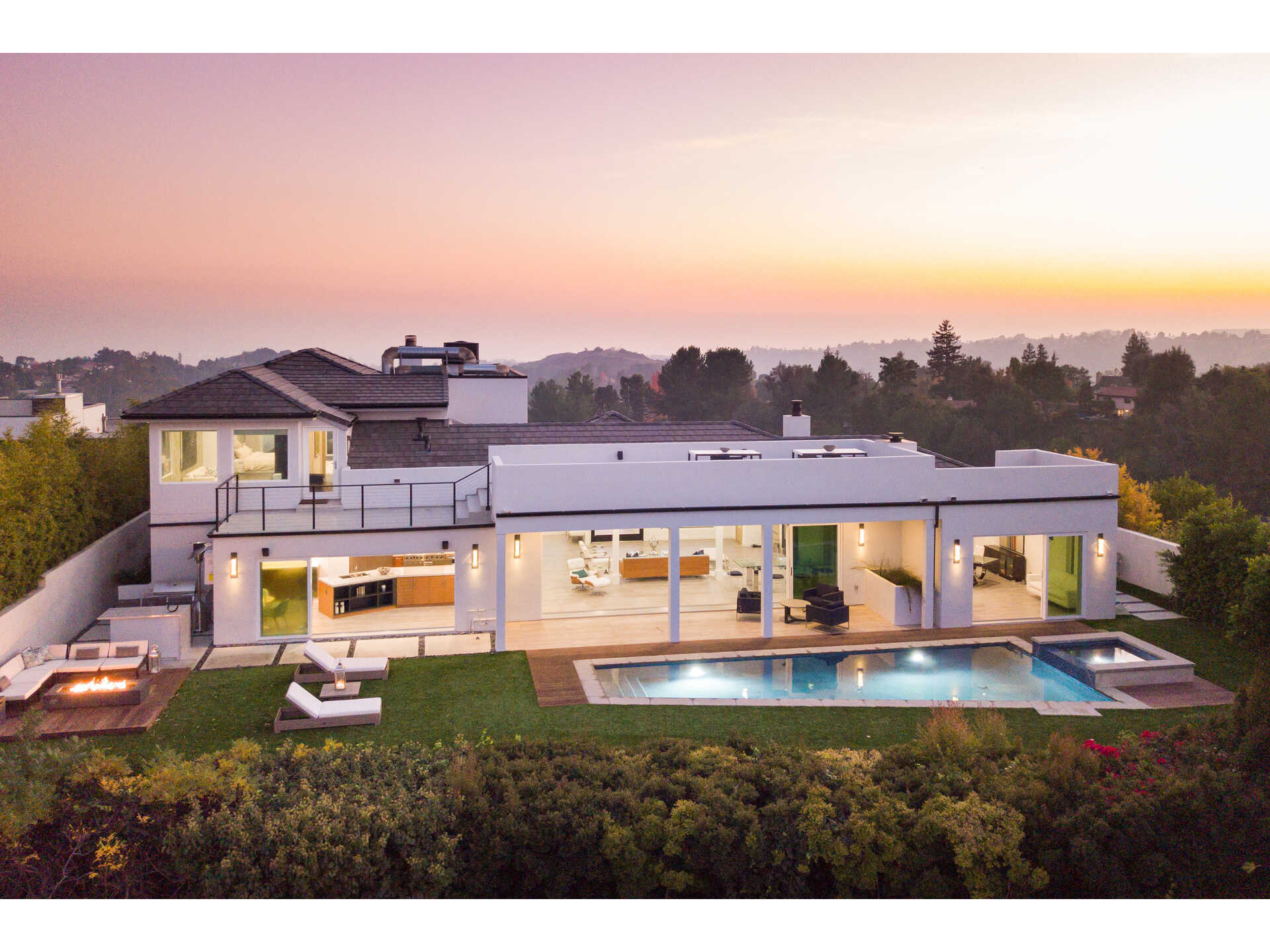 Set atop famed Mulholland Drive, this magnificently redesigned private oasis in the hills