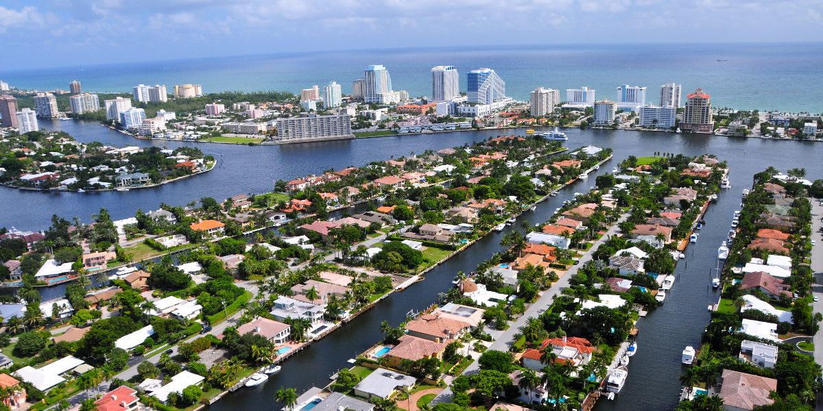 an aerial view of waterfront homes and buildings in Fort Lauderdale