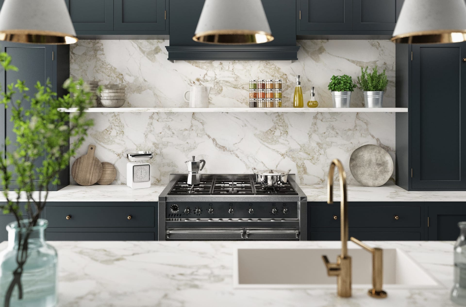 A kitchen backsplash design including a stove, sink, glass vase, white marble countertop, cabinets, and pendant lights.