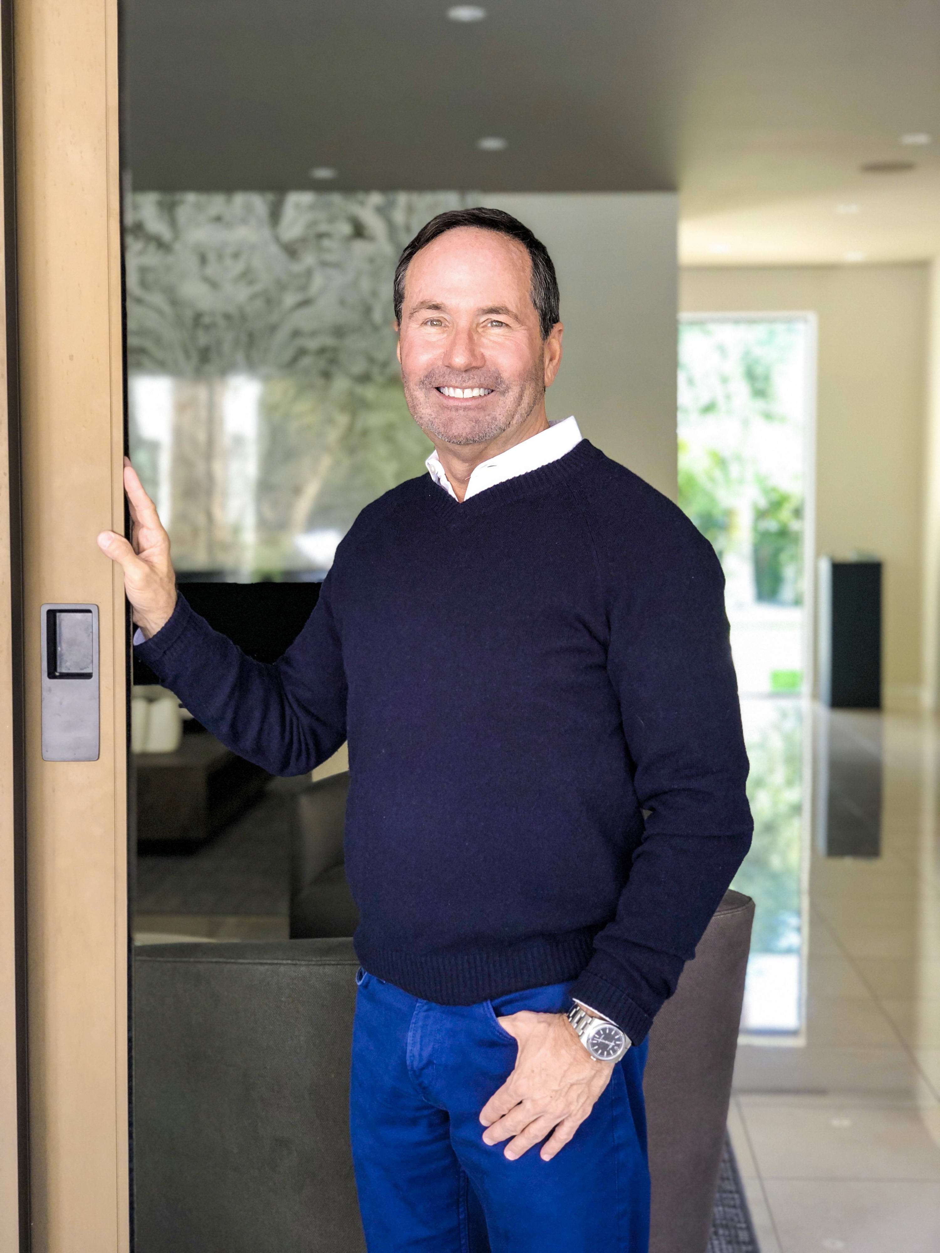 A profile photo of Gregg Fletcher standing in the door