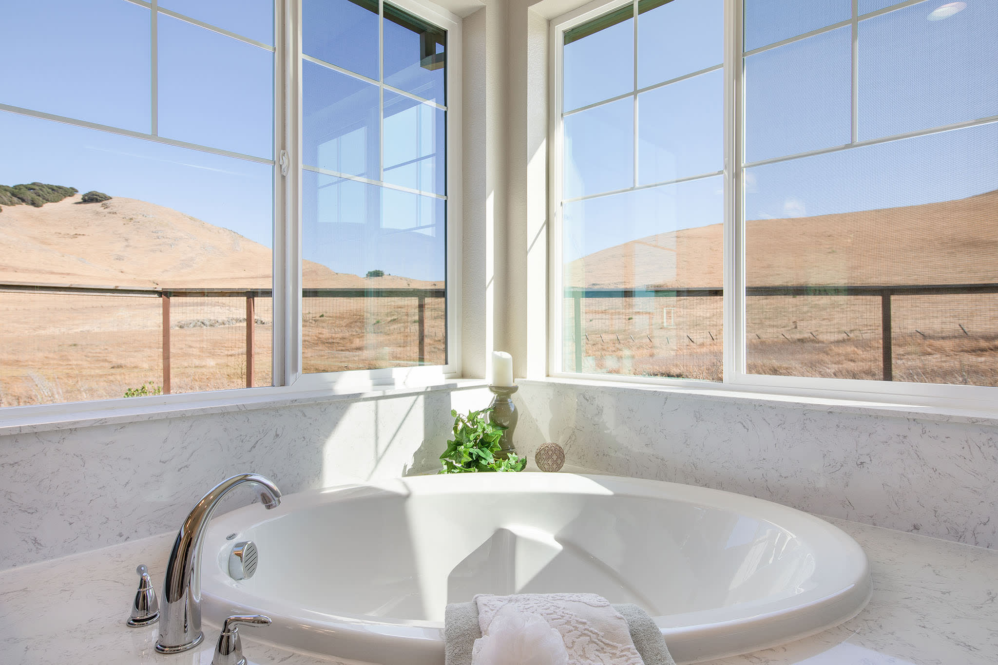 A luxurious bathtub with a view