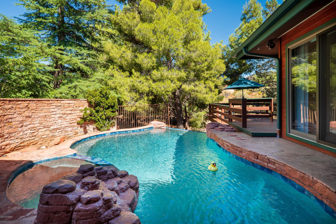 Exceptional Village Home. Pool, Hot-tub and In-law unit all on a large lot! 