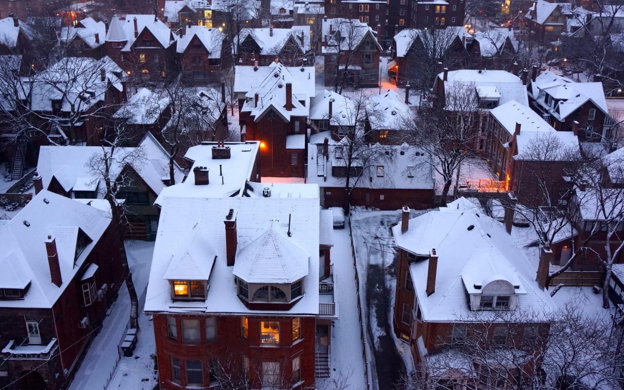 snowy single family homes in The Annex Canada