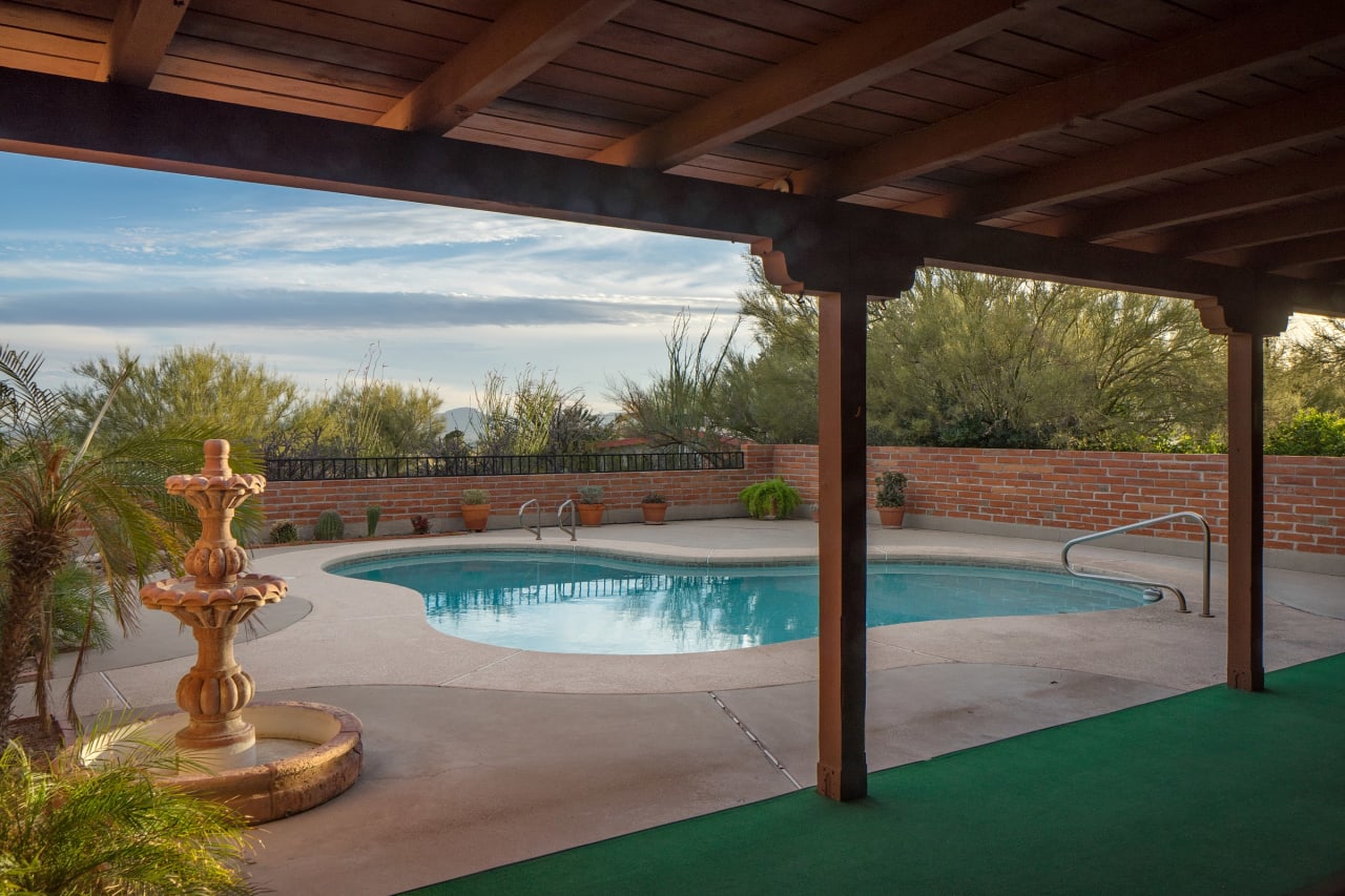 SITUATED IN THE DESIRABLE VISTA DE LAS CANDELAS ESTATES