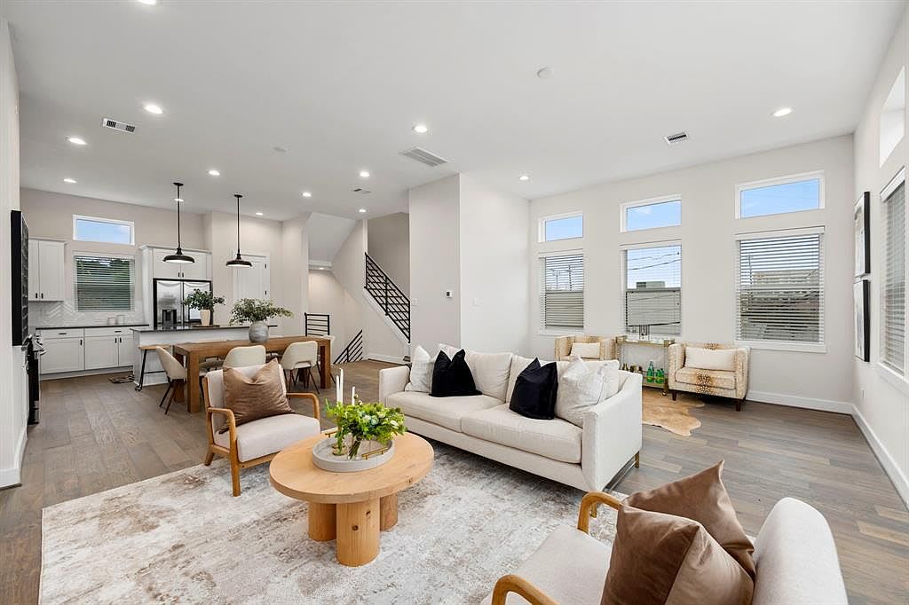 furnished living room with a coffee table 