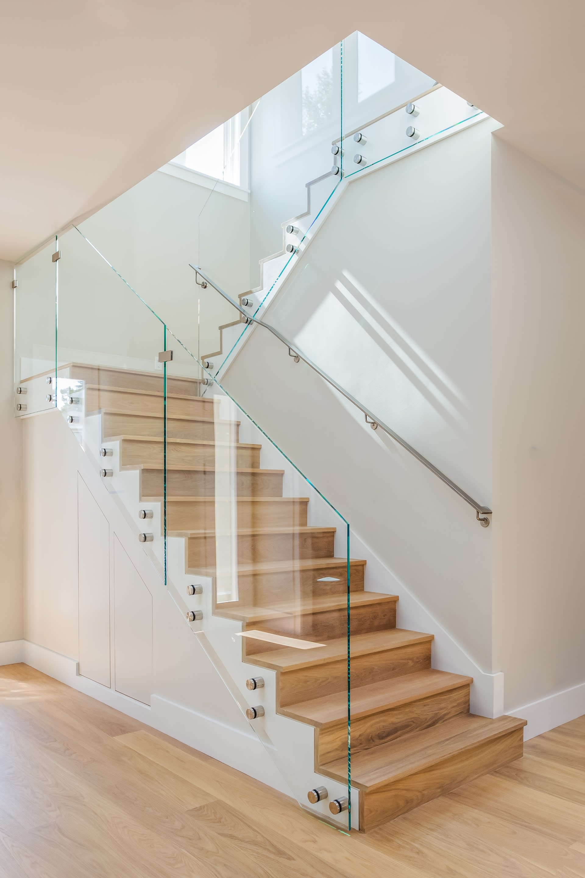 Anaheim Hills luxury homes elegant modern staircase with glass railing in California