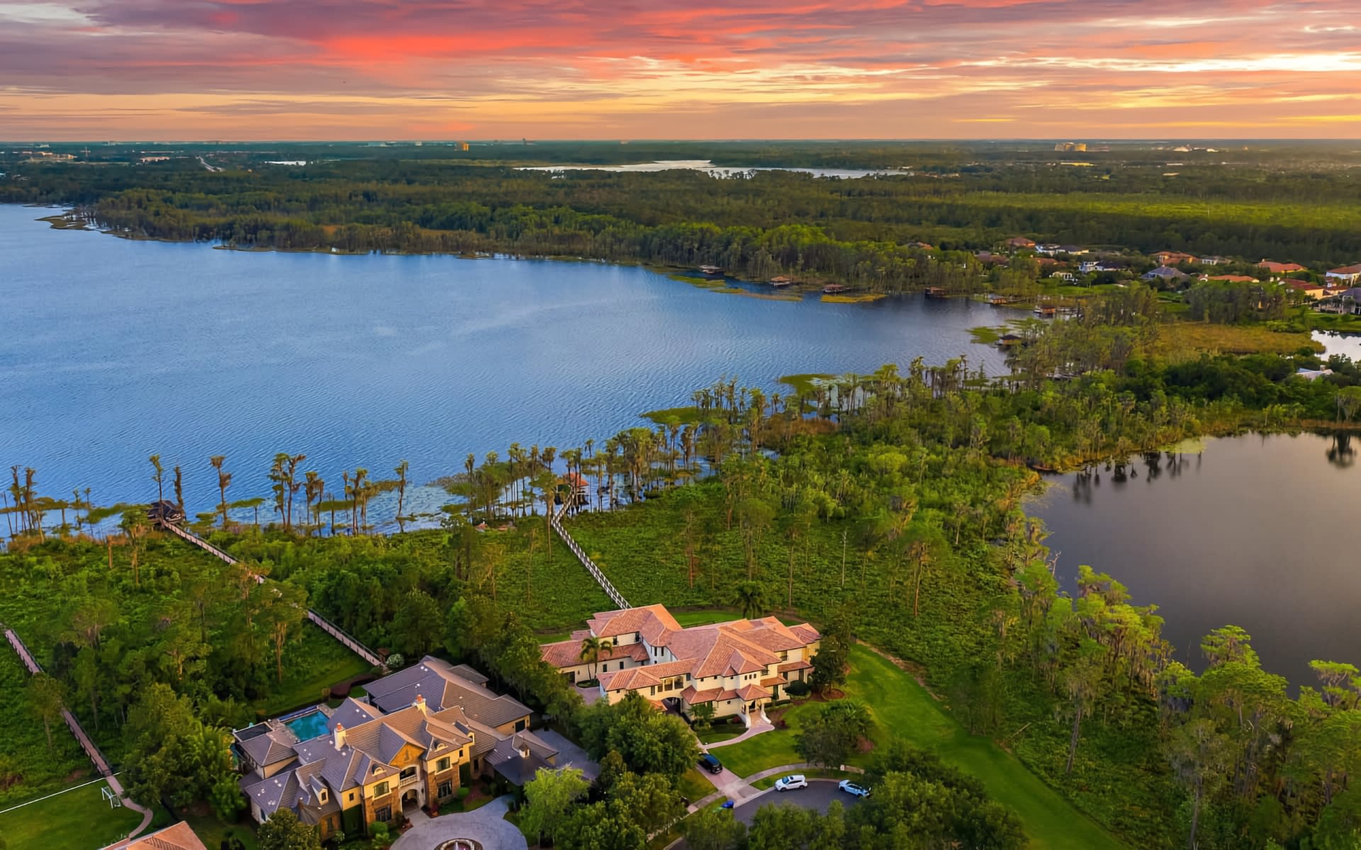 Aerial photo at sunset of Butler chain of lakes Windermere, Florida