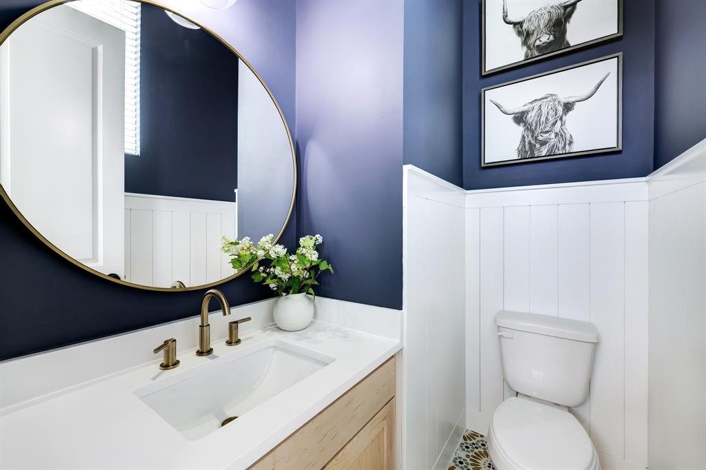 bathroom with a large mirror 