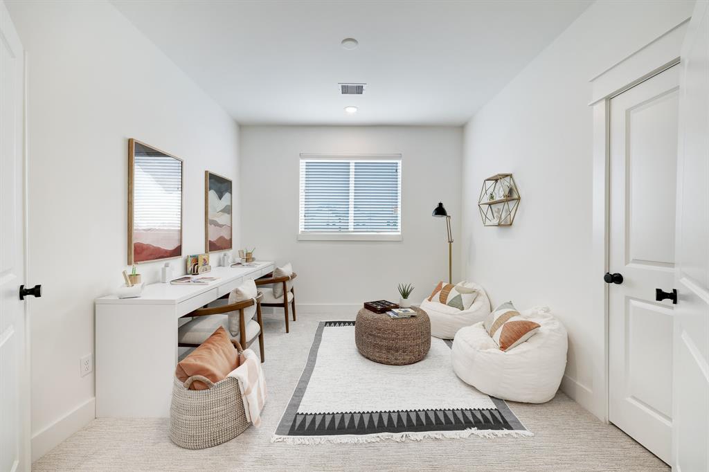 furnished bedroom with a vanity 