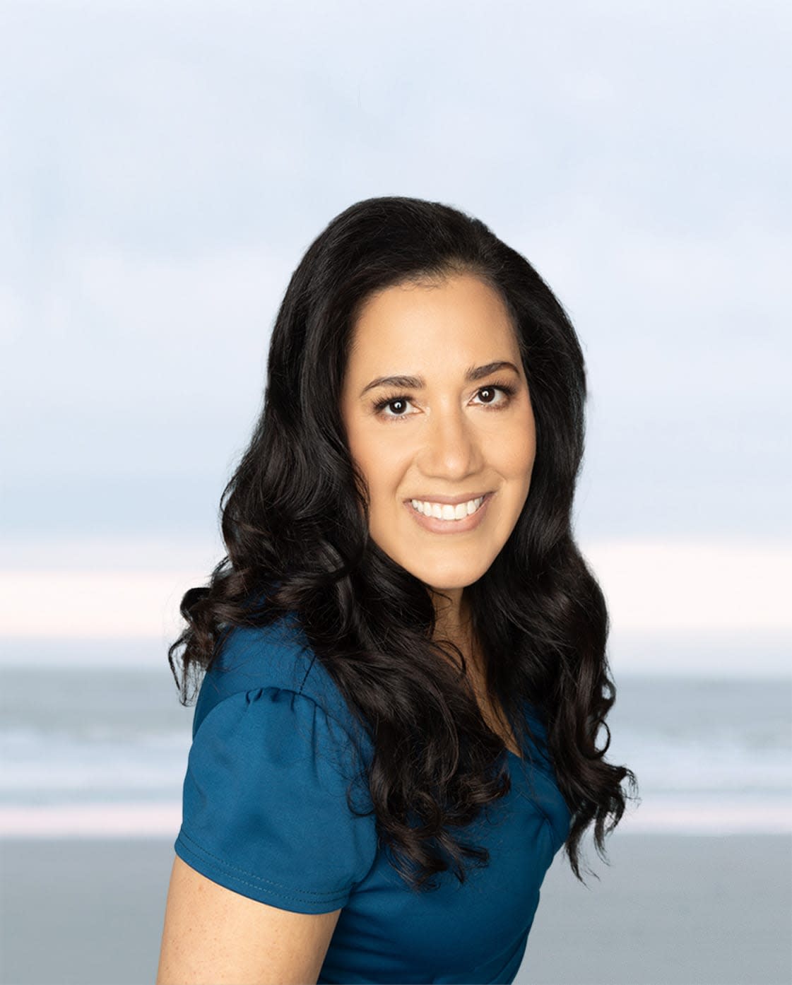 Michelle Wiedemuth Headshot wearing blue shirt