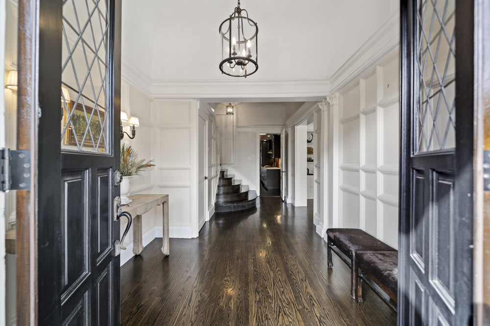 grand-entry-black-doors-chandelier