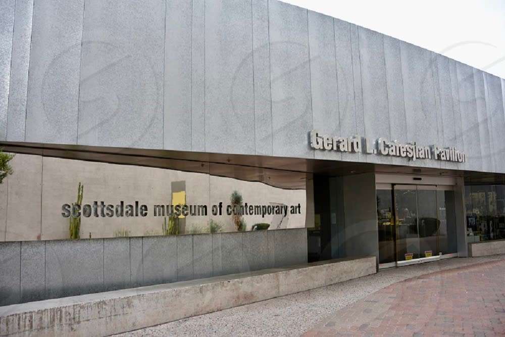 Scottsdale Museum of Contemporary Art exterior with its name displayed on the stone facade.