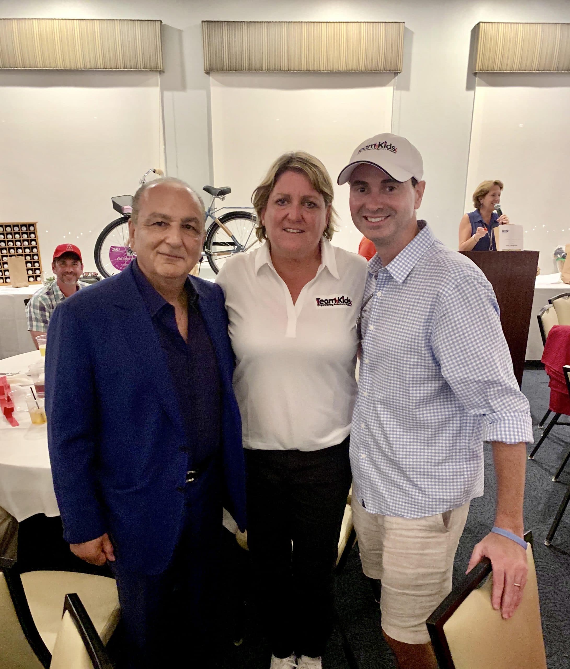 Cameron Merage, Julie Hudash, and Charles Glorioso at the Superhero Golf Classic