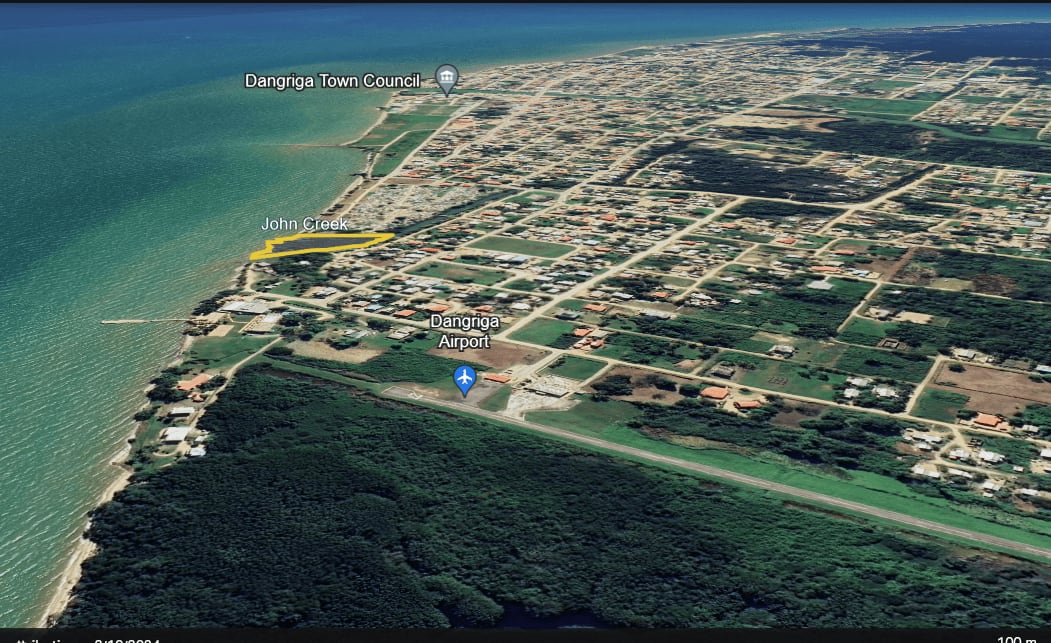 Charming 1.6 acre Caribbean Beachfront peninsular in Dangriga Town, Belize