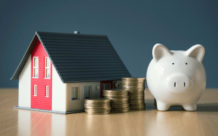 house-beside-a-piggy-bank