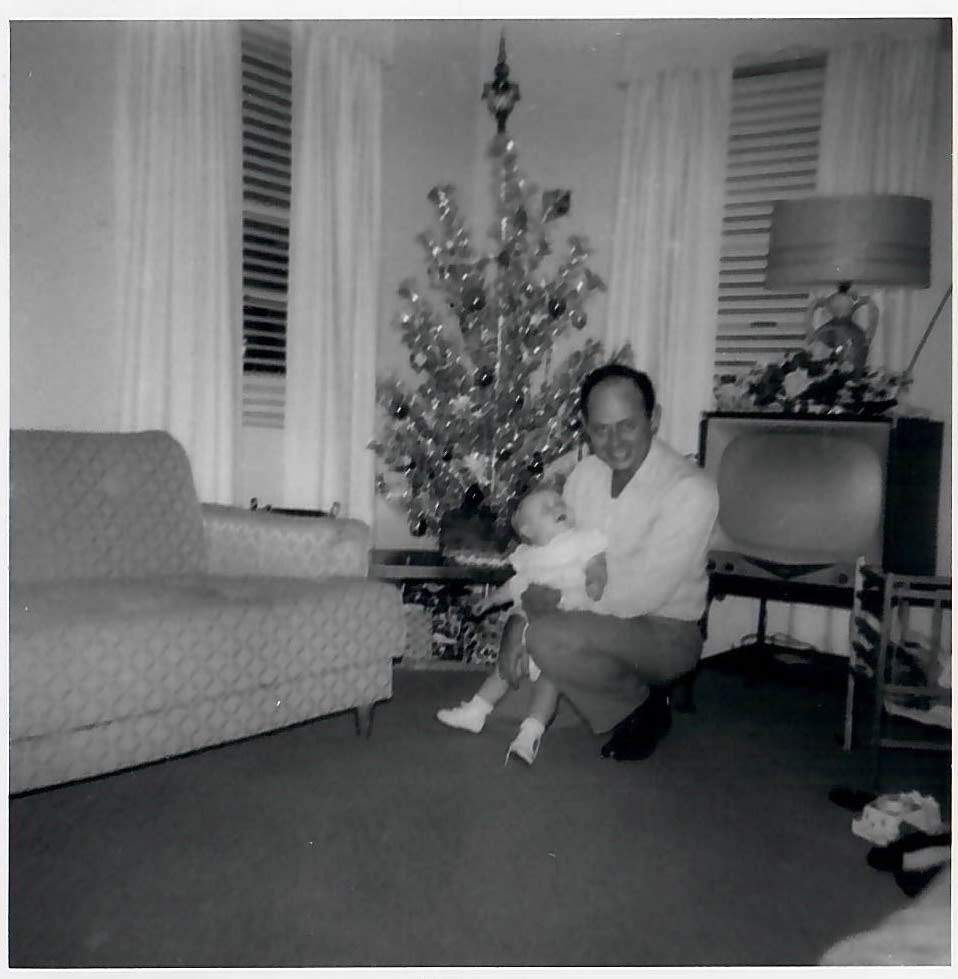 Sheila with her dad as a child
