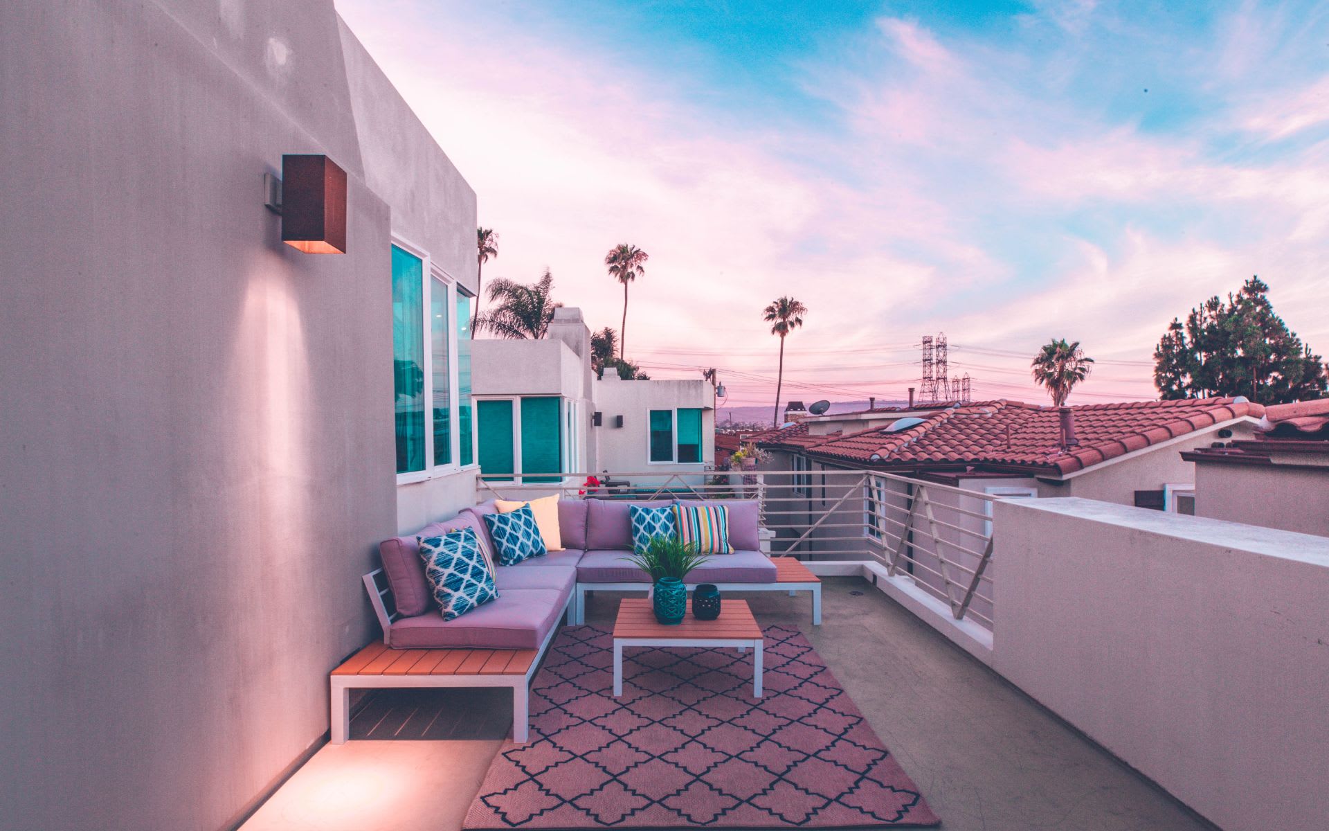 a 2nd floor home patio in San Diego, with pink tinting from the sunset