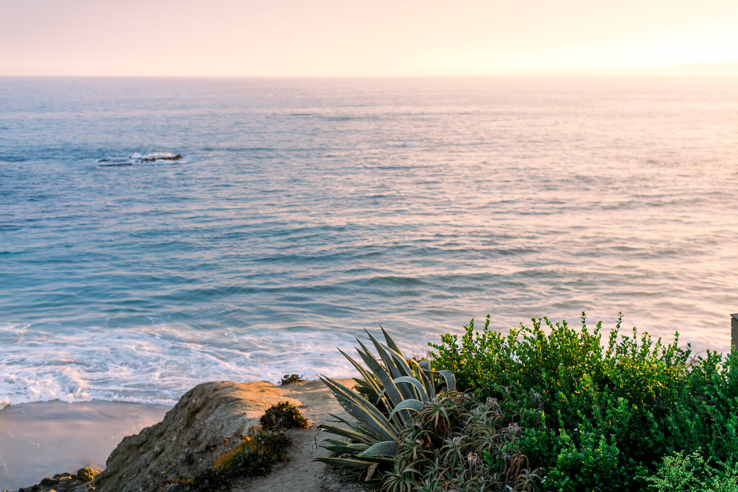 Surfers enjoying the waves at Thalia Street Beach, Laguna Beach