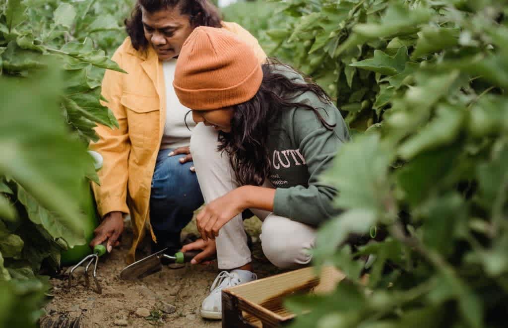 two girls urban gardening