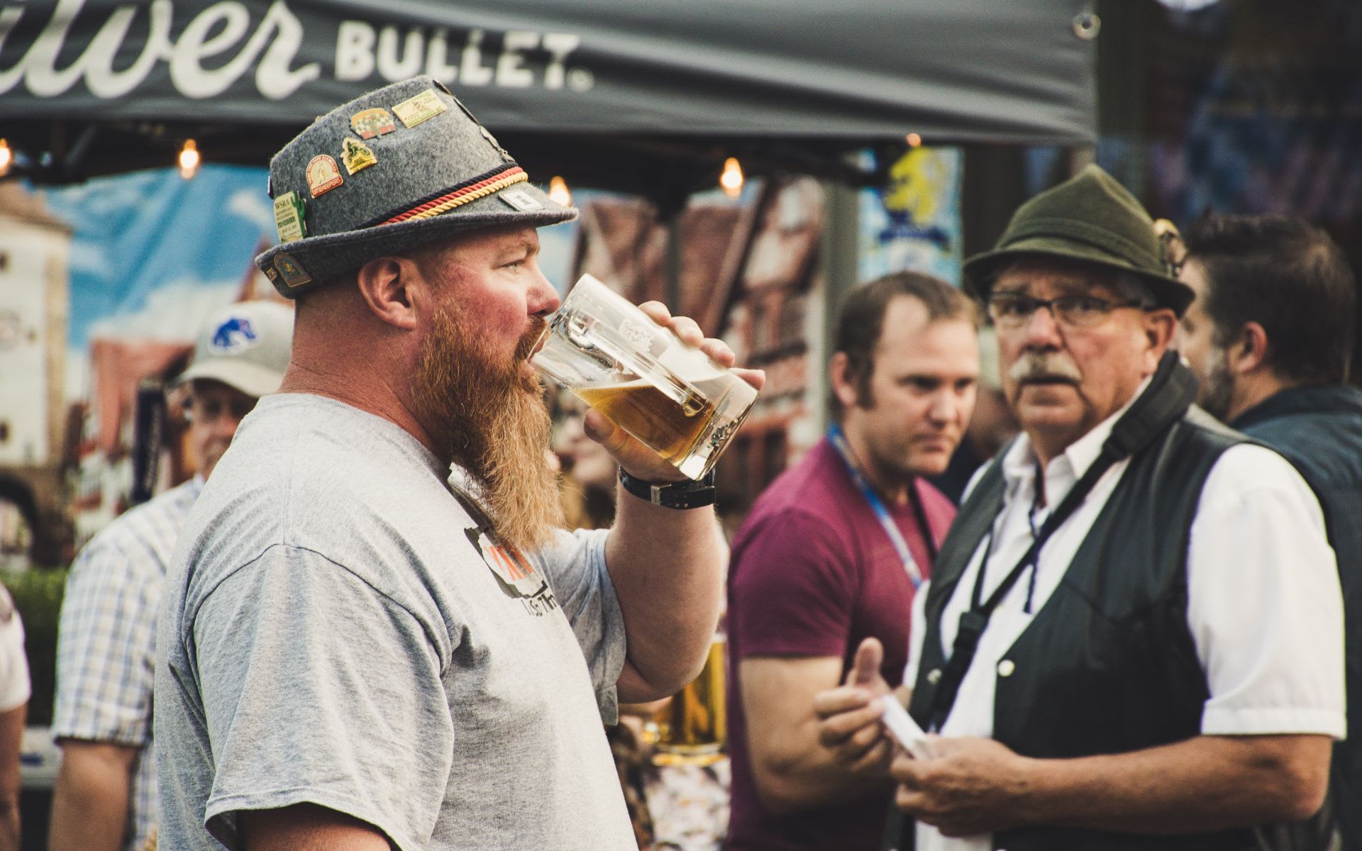 San Diego man enjoying a beer during Oktoverfest in San Diego