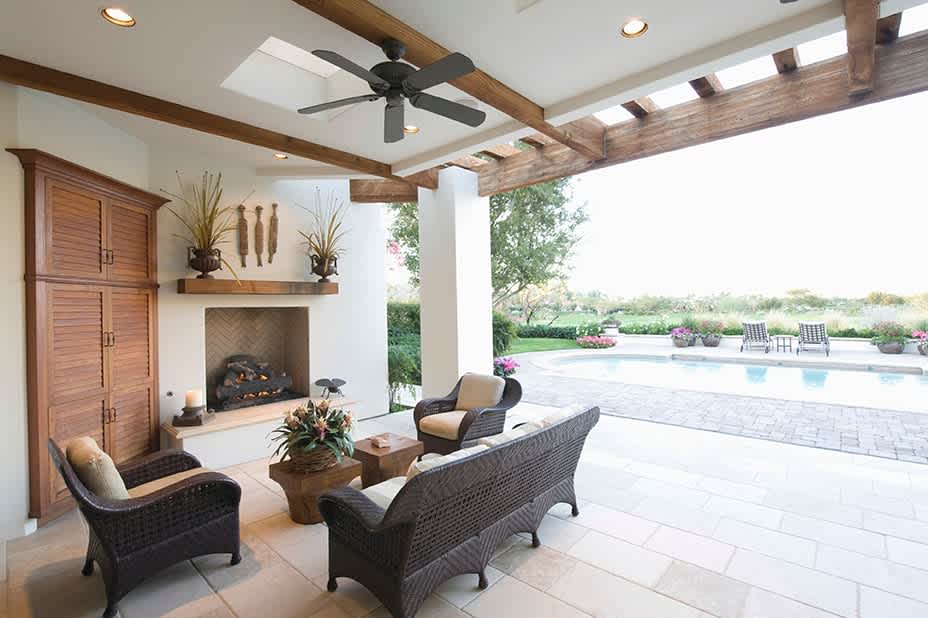 Swimming pool with seating area in outdoors room