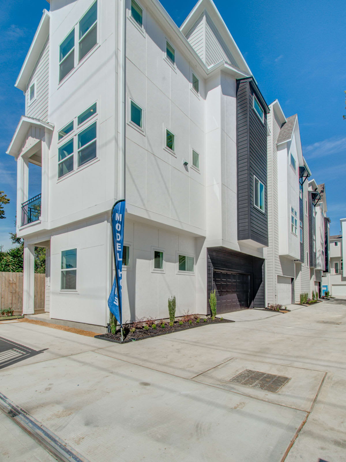 Tall photo of a new townhome by Oracle City Homes