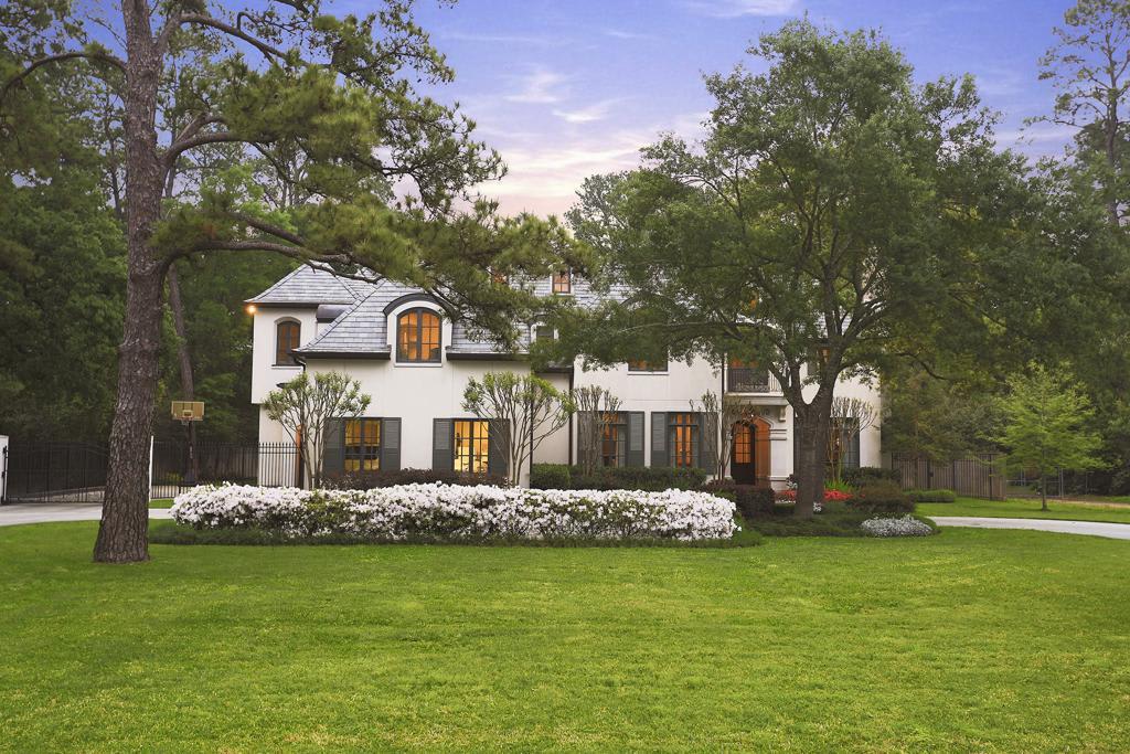 A white house with a black roof