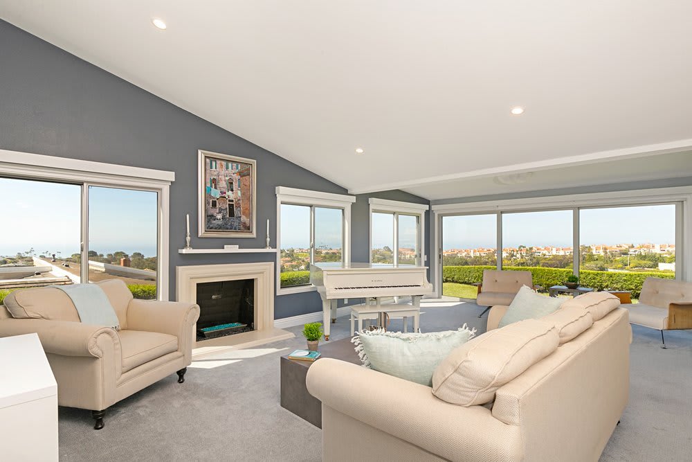 31105 Almara living room with soaring ceilings and abundant windows