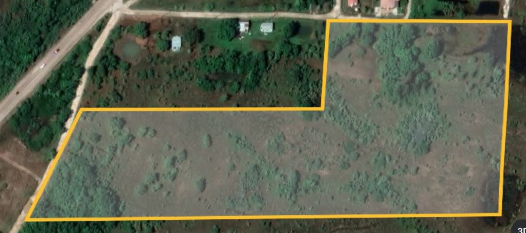 15 Acre development property with access to utilities near 12 miles 