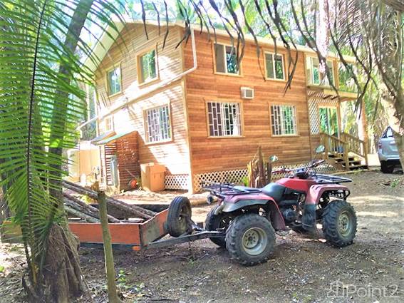 34 Acre Off-grid ecotourism or agricultural land with seasonal creek and bonus starter home