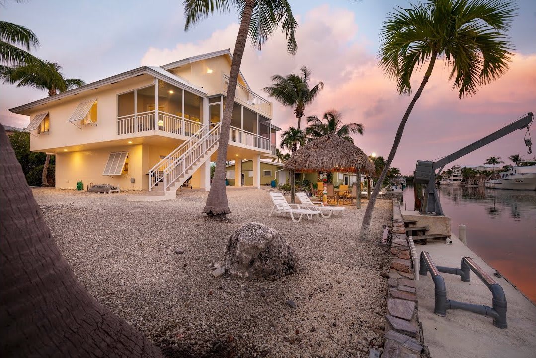  Three Story Traditional Keys Home | 153 Valencia Drive, Isla Morada